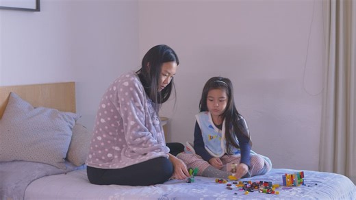 Happy mother and daughter playing at home - Free Stock Video