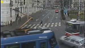 21K views · 146 reactions | Shocking surveillance video shows a car getting sandwiched between two trams. Despite heavy damage to the car, the driver escaped with minor injuries. https://cbsn.ws/2r6wpw3 | CBS Mornings | Facebook