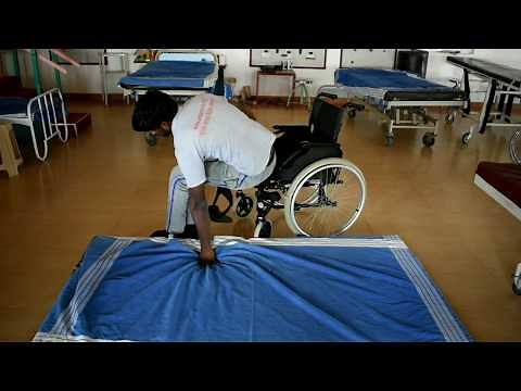 spinal cord injury wheelchair floor transfer