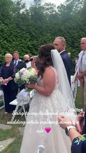 I sang to my husband at our Wedding while walking down the aisle 💍💐👩‍❤️‍💋‍👨#southernwedding #morilee #scbride #countrymusic #carrieunderwood #lookatme #fyp