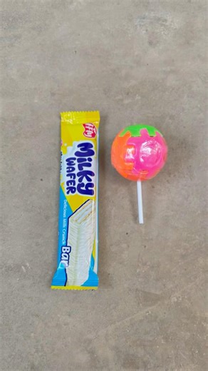 Roll cube lollipop unboxing with fake milky bar #shorst #cube #lollipop #milk