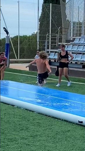 BIGGEST slip’n slide in the 🌏 #airtrack #gymnastics #tumbling #parkour #backflip #peopleareawesome