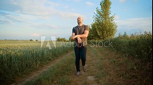 Bald man energetically dancing, mimicking iconic dancer moves. Guy passionately performing expressive choreography, channeling famous style. Male artistically replicating signature dance gestures with