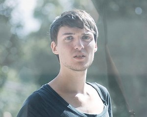 Candid Portraits of People Peering at Their Own Reflections