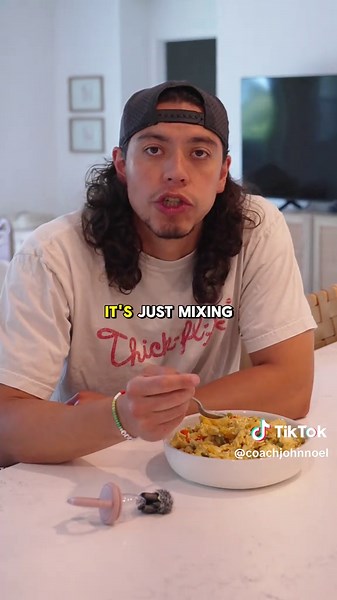 Ingredients: @Kevin’s Natural Foods Thai style coconut chicken Microwaveable jasmine rice Frozen bell pepper trio 2 servings: ~550 calories 36 protein 65 carbs 15 fat Per serving This is how I actually “cook” and eat most of the time. It’s only when my wife cooks or we eat out that it’s any different. Make sure to follow for more meal ideas that take no thought or effort at all. Shorts: @Raskol apparel - code jnoel for 10% off Checkout my “it’s not cooking; it’s just mixing stuff” cookbook throu