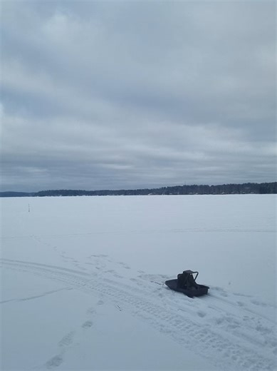 Exploring the Serenity of Ice Fishing in Finland's Nature