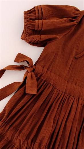 Janelle | Rosery Apparel on Instagram: "All the details from my latest pattern-hack 🎀🤎 I made this gathered bow dress by pattern-hacking my Pansy pattern, and you can find the step-by-step sewing tutorial over on my Youtube if you’d like to make one for yourself!"