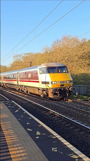 LNER Class 91 Number 91106 Named Swallow in InterCity Swallow Livery Passing Outwood Station