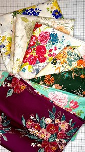 1K views · 14 comments | Let’s flip the lights up for 2025!!! I am starting it with new calendar (thanks @allpeoplequilt !!), fresh coffee, fabrics and flowers (together in one!). Now what could this pile of beautiful florals be..?? Any guesses?? HOW ABOUT YOU? HOW ARE YOU FLIPPING THE SWITCH IN 2025? Let’s share dreams, plans and wishes!! 殺 #newyeardreams #quiltingplans #happynewyear | Mara Quilt Designs | Facebook