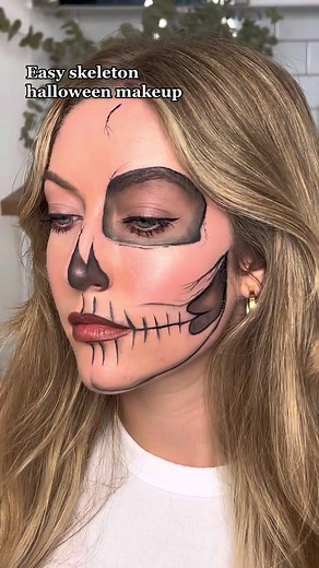 Easy half-skeleton makeup for halloween. Sketch out the skull areas with a khol pencil before shading in, gradually adding more depth. Once you’re happy with how it’s looking, outline with a pen or gel liner for extra definition. Have fun 💀 #halloweenmakeup #halloweenmakeuplook #skullmakeup #halfskullmakeup #skeletonmakeup #easyhalloweenmakeup