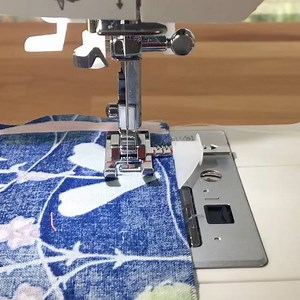 The Sew Easy foot on my new machine from Singer Sewing Company ... it has a seam guide! Read more about it on my blog today. ❤️❤️❤️#singerconfidence #sewallthethings #seweasy | SewCanShe.com