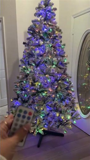 This 7.5 ft flocked pre-lit Christmas tree has EVERY light option you could dream of