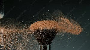 Super slow motion of makeup brushes with flying brown powder. Filmed on high speed cinema camera, 1000fps. Speed ramp effect. Stock Video