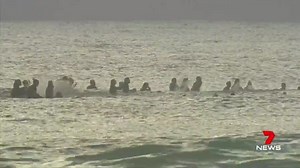 Some of surfing's biggest names have helped remember the life of Olympian Alex 'Chumpy' Pullin, who drowned this week on the Gold Coast. They joined his heartbroken girlfriend to honour a "one in a million guy". www.7NEWS.com.au #7NEWS | 7NEWS Brisbane