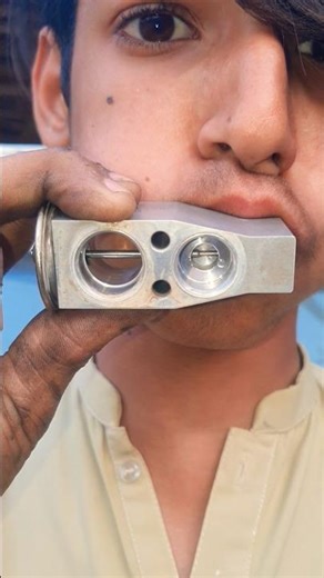 how does check car ac expansion valve?