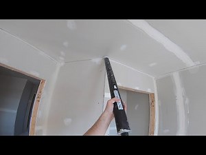 Taping drywall corners with a compound tube