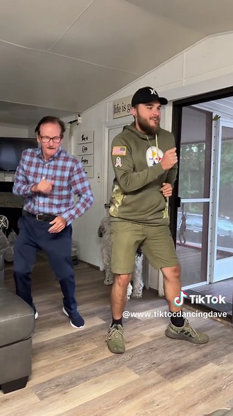 Grandpa and Grandson Dance Together for Lasting Memories