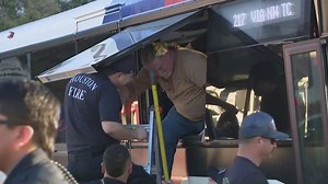 METRO bus jumps curb in downtown Houston