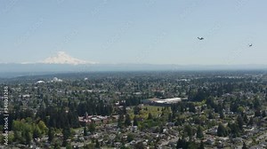 Boeing C17 Globemaster Aircrafts Flying Over Tacoma, Washington Under The Clear Blue Sky - aerial wide shot