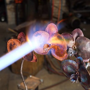 16K views · 19 reactions | Expert Blacksmith Makes a Metal Flower! | Lady Panda | Facebook