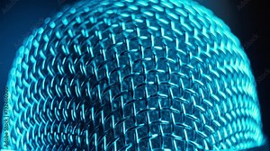 Microphone head rotating with blue light. Concert microphone at dark background. Professional microphone in recording studio. Podcast concept. Chrome mic with blue light. Close-up in 4K, UHD