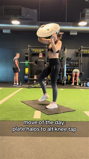 Move of the day: standing weighted plate halos to alternating knee taps (tighten & sculpt your core)