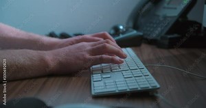 Typing keyboard man remote working, close-up slow motion, studio shot in 4K prores HQ