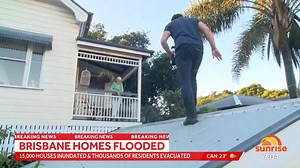 No ladder? No worries! Matt Doran climbed onto a roof to check on and interview a Brisbane flood victim whose home is surrounded by water. | Sunrise