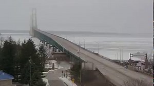 111K views · 805 reactions | Caught on Camera: Look what our weather cam caught a few minutes ago. A driver was crossing the Mackinac Bridge, while it's shut down due to falling ice. A few moments later, police are seen pulling him over. The bridge has been closed for about six hours. Details: https://upnorthlive.com/news/local/mackinac-bridge-closed-due-to-weather-03-24-2022 | UpNorthLive | Facebook