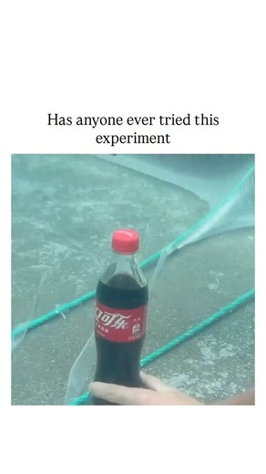 FullOnFunny on Instagram: "The instagram post shares a 19-second video of a hand opening a sealed Coca-Cola bottle underwater in a pool, where bubbles of CO2 escape slowly and water enters the bottle, creating an air pocket without surface-level fizzing. Scientifically, this occurs because hydrostatic pressure at shallow depths (about 1-2 atm) keeps CO2 dissolved longer per Henry's Law, allowing controlled degassing and water replacement, as demonstrated in experiments like those in the Journal
