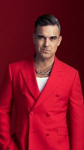 399K views · 636 reactions | And in one of the most unforgettable moments of his career, Robbie Williams shared a passionate onstage kiss with a fan during his performance of “Come Undone” at Knebworth in 2003 right in front of 120,000 people. The moment became one of the most talked-about highlights from his record-breaking run at the iconic venue. . . . #music #hitsongs #globalsongs #explore #songs #song #robbiewilliams | Finding Hit Songs | Facebook