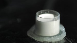 clip-1086250868-close-up-view-tattoo-studio-artist-loads-magnum