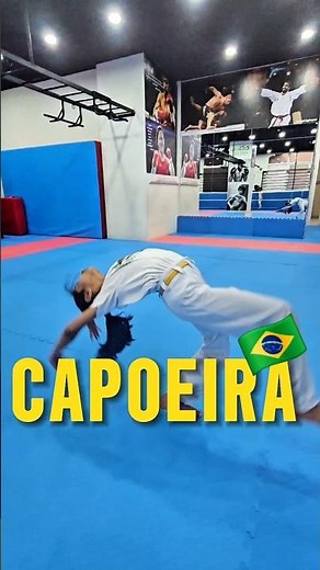kids capoeira solo sequence kicks and acrobatics