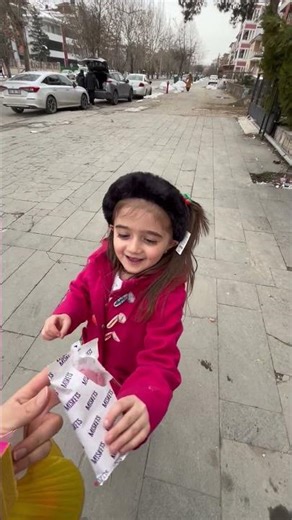 What color is Aden Melis's lab coat?