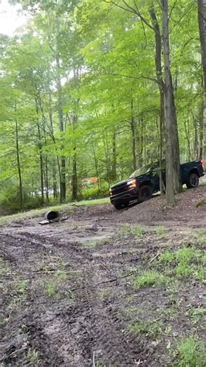 The creek in front of the shop claimed another one #offroad #mud #mudding #chevy #chevytrucks