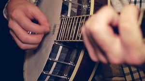 Download Man Playing the Banjo in 4K