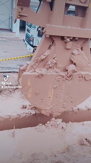 Mechanical Excavator in Action at Construction Site