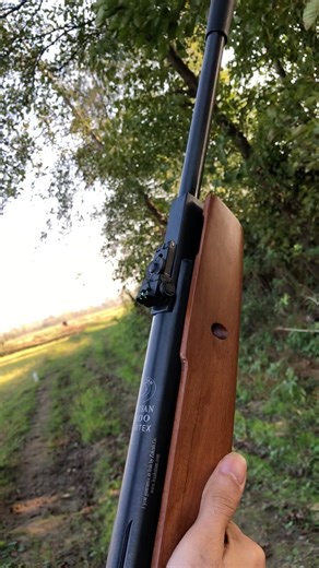 Shooting a water bottle with a powerful spring-loaded shooter