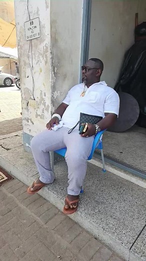 Relaxed Urban Setting with a Clutch Bag