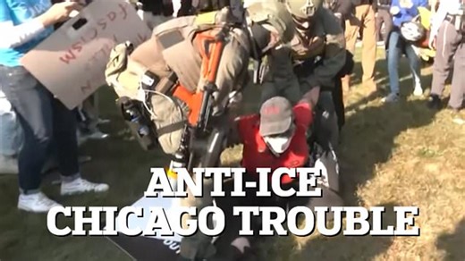 Scuffles and arrests as anti-ICE protest continues in Chicago