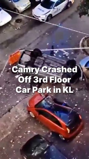 【🚗 Terrifying Crash at Jalan Klang Lama 💥】 A shocking incident occurred when a Toyota Camry suddenly plunged off the 3rd floor of a service apartment car park on Jalan Klang Lama 😱 The 23-year-old foreign car wash worker had just finished cleaning the car and was attempting to park when he mistakenly hit the accelerator instead of the brake 😨 The Camry smashed through a wall and landed on two parked cars below — a Proton Iriz and a Perodua Myvi. Thankfully, both were unoccupied at the time �