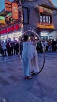 An Ethereal Cyr Wheel Performance in the Heart of Tradition