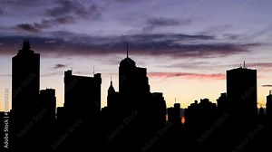 Tennessee: Memphis downtown skyline at Twilight, Time Lapse at Dusk with Colourful Sky and Dark Silhouette of Slyscrapers, USA