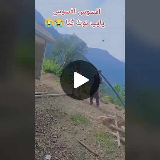 Men in Traditional Attire Working in Scenic Mountains