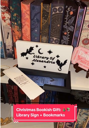 Just wanted to show off real quick the bookmark holding library sign @harden_legacy made me for Christmas 🎄📚 some really cool bookmarks he had made from Walgreens. I’m obsessed. #3dprinting #BookTok #BookishGifts #Bookmarks #BookLover