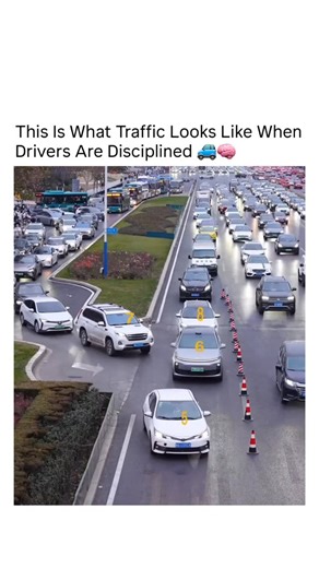 Exploring Technology on Instagram: "During rush hour on a construction-narrowed highway in Jinan, drivers demonstrate textbook zipper merging by using both lanes fully and merging alternately at the closure point. Instead of rushing or blocking others, each vehicle takes turns, allowing traffic to move continuously without sudden braking or long backups. Traffic research shows this method reduces congestion by maximizing available road space and minimizing stop-and-go waves. The clip highlights