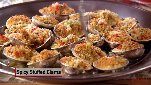 Everyone loves Baked Clams and here is my favorite recipe - plus I'll show you a simple way to open the clams for stuffing. These are best served hot out of the oven, so I always tell my eager guests to go slowly. Buon Gusto! #LidiasRecipes #LidiasItaly #LidiasKitchen #LidiaBastianich #ItalianFood #LidiasTheArtofPasta #LidiasOliveOil https://lidiasitaly.com/recipes/spicy-stuffed-clams/ Great with - https://youtu.be/XvPgzVPVGL8 | Lidia Bastianich