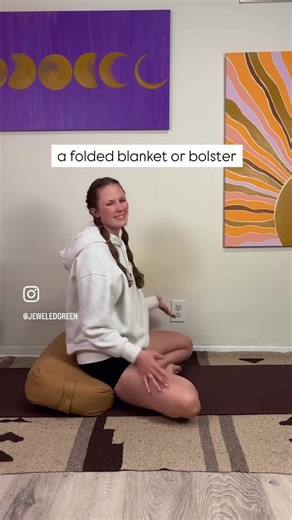 Sit on an object to relax hips and support posture