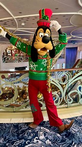 Which would you do - rock, paper or scissors? Would you have beaten Goofy? We love a fun character interaction and when we bumped into Goofy roaming around on the Disney Wish, this was definitely an interaction that we will remember! #disneycruise #disneycharacter #goofy #disneytrip #disneyvacation #disneycruiseline #disneyland #disneyparks | Adults in Disney