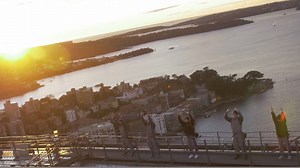 12 yogis saluted the sun as dawn broke across Sydney to celebrate World Yoga Day Australia today. | BridgeClimb Sydney